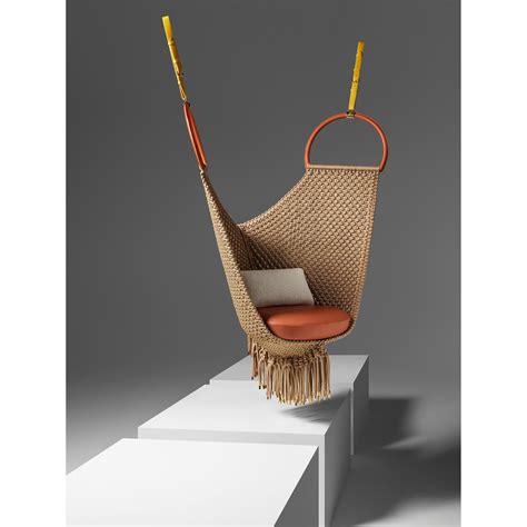 Products by Louis Vuitton: Swing Chair by Patricia Urquiola.